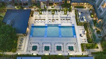 An aerial view of resort style pool at night